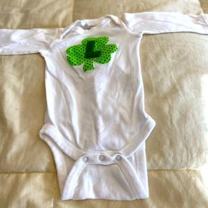 St. Patrick’s Day Shamrock ‘L’ Long-sleeved Onesie